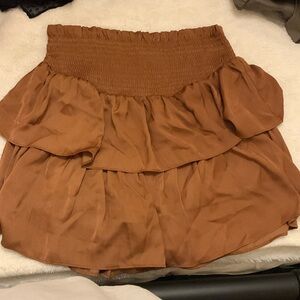 Brown high waisted skirt with shorts built in. Blue rain size L.